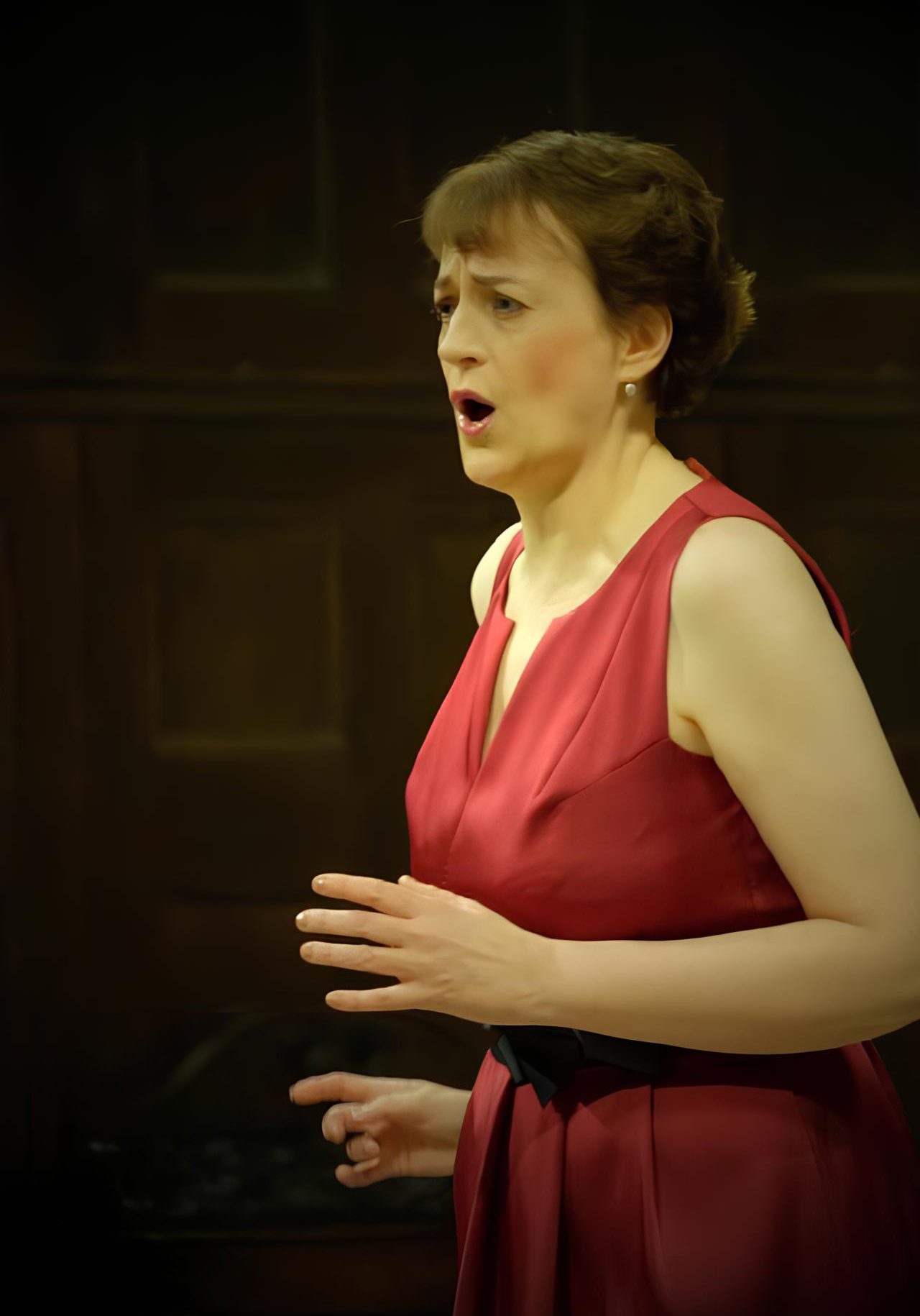 Alison singing at a classical performance